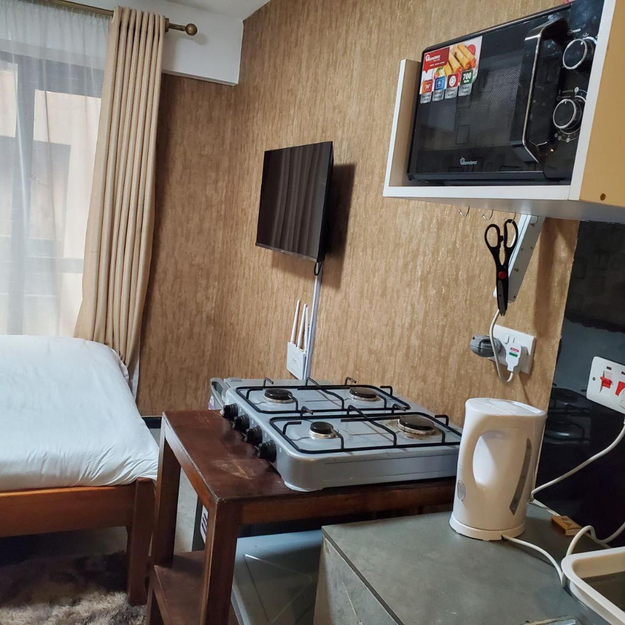 Lovely & Cozy Compact Studio Near Airport With Rooftop View Apartment Nairobi Luaran gambar